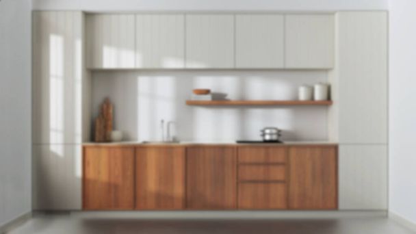 Blurred background, japandi trendy wooden kitchen. Modern cabinets, contemporary wallpaper and concrete floor. Minimalist interior design - Foto, Imagem