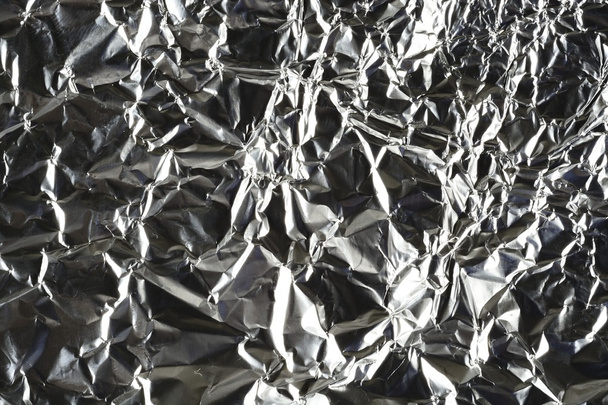 Folha de alumínio amassada
 - Foto, Imagem