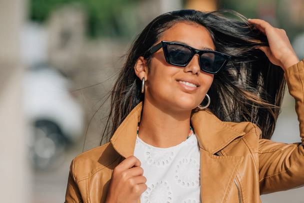 portrait of latina hispanic american girl with sunglasses - Foto, Imagen