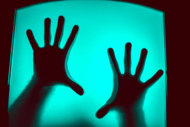 scary picture of hands behind glass, horror ghost behind door, Halloween  concept - Fotoğraf, Görsel