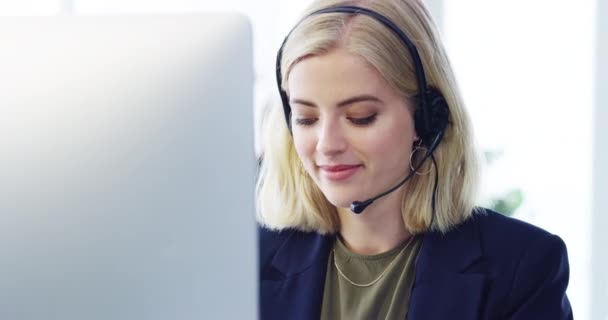 Contact us, call center and customer service with a woman working in sales, telemarketing or crm with a headset. Support, help and consulting with a young female consultant in her office at work. - Video