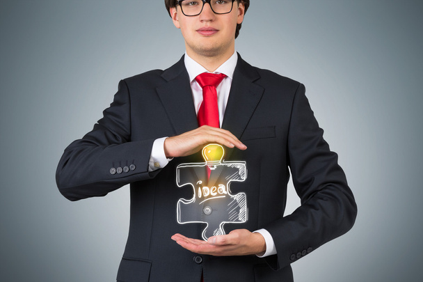 businessman holding puzzle - Foto, Imagem