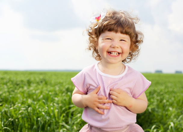 Portrait of a little girl outdoors - Фото, зображення