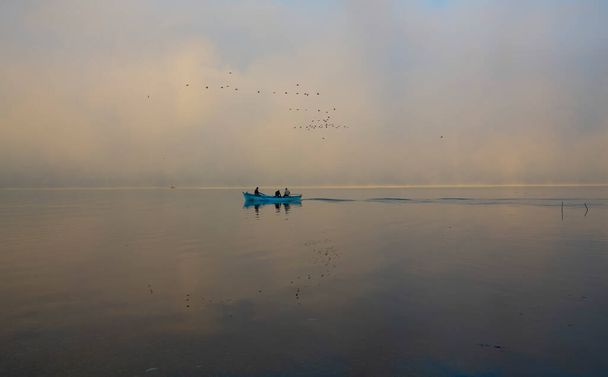 Fishing boats in the Beysehir lake, Konya. Beysehir lake is beautiful lake with nature. - Foto, imagen