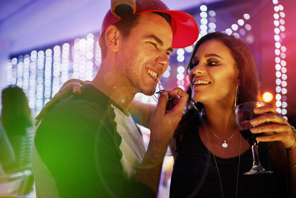Friday More like Fri-YAY. a young couple enjoying themselves at a nightclub - Valokuva, kuva