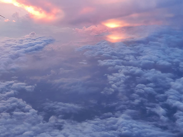 Dramatic blue storm clouds. Aerial view over the clouds. - Foto, imagen