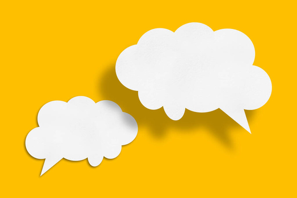 white cloud paper speech bubble shape against yellow background design - Zdjęcie, obraz