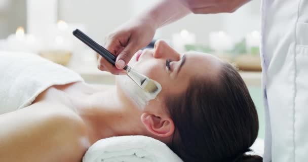 Facial mask, skincare and spa in zen wellness, luxury massage or healthcare peace room. Zoom on women or worker hands with cleaning face or skin care product in beauty salon for a relax sleep on bed. - Filmmaterial, Video