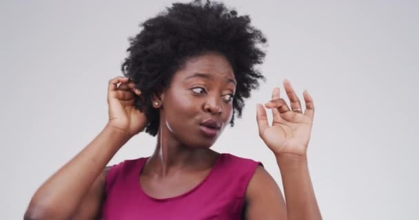 Happy portrait of woman party and dance against a grey studio mockup background. Crazy, funny and young black female has fun dancing to music with an afro hairstyle and happiness moving with rhythm. - Video