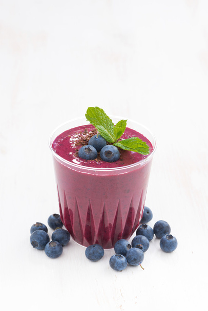 blueberry milkshake in a glass, vertical - Zdjęcie, obraz