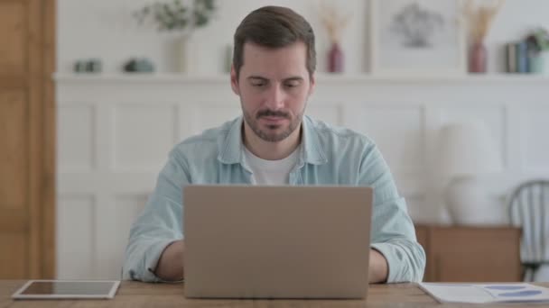 Casual Man Showing Thumbs Up While using Laptop  - Imágenes, Vídeo