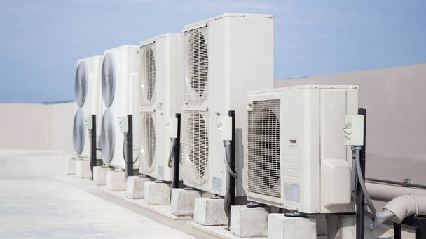 Air conditioner compressor installed outdoors. - Foto, Imagen