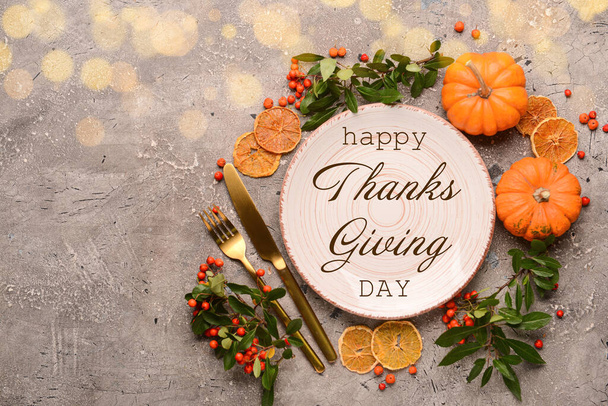Beautiful autumn table setting for Thanksgiving Day on grunge background - Foto, afbeelding