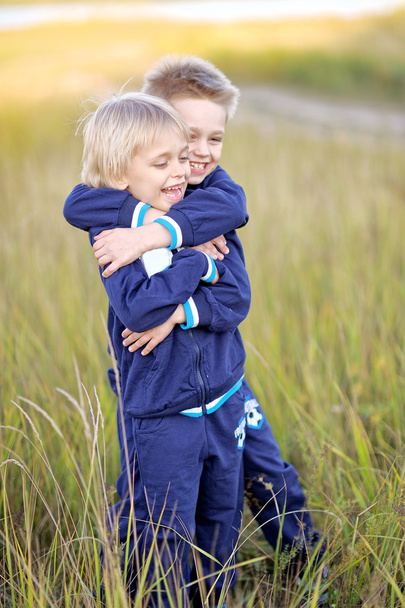 portrait of two little boys on the beach in summer - Foto, immagini