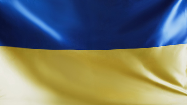 top view of ukrainian flag with blue and yellow colors, support ukraine concept - Fotó, kép