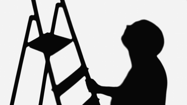 silhouette of handyman near shadow of ladder isolated on white - Foto, Imagen