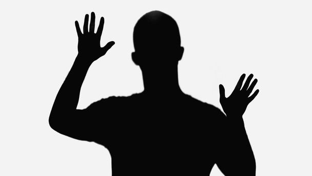 black silhouette of man waving hands isolated on white - Φωτογραφία, εικόνα