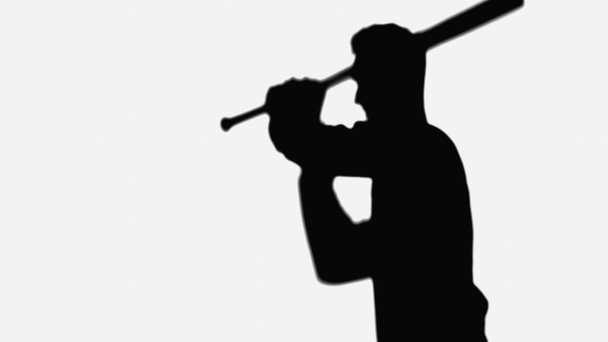 silhouette of man with baseball bat isolated on white - Photo, image