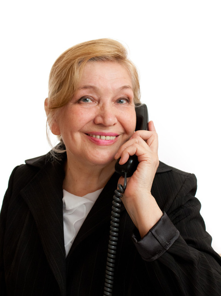 白を上の黒のスイートには電話で話している年配の女性 - 写真・画像