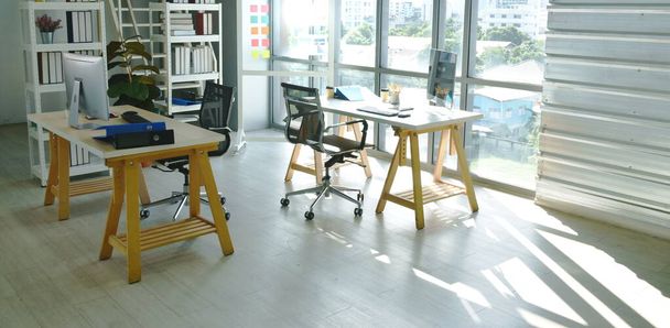 office room with business supply for meeting and television screen with morning sunlight - 写真・画像