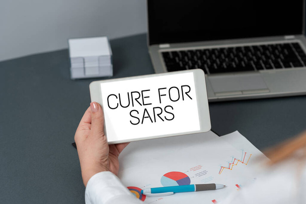 Conceptual caption Cure For Sars, Word Written on Medical treatment over severe acute respiratory syndrome Hands Of Woman With Blank Sheet Representing Advertisement And Branding. - Photo, Image