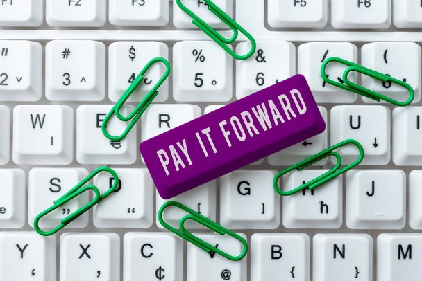 Writing displaying text Pay It Forward, Business approach Do the payment a certain amount of time after purchasing Piece Of Carboard With Important Message Surrounded By Colorful Pegs. - Photo, Image