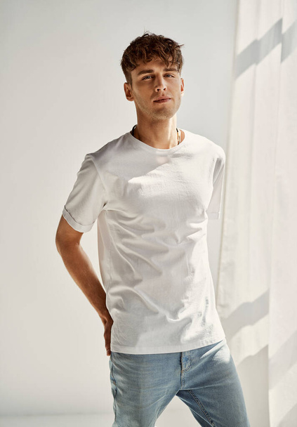 Handsome male model isolated on white background  - Valokuva, kuva