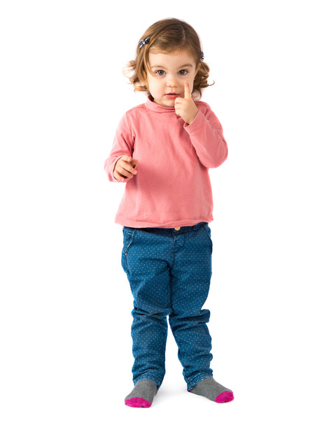 Little girl thinking over white background  - Foto, immagini