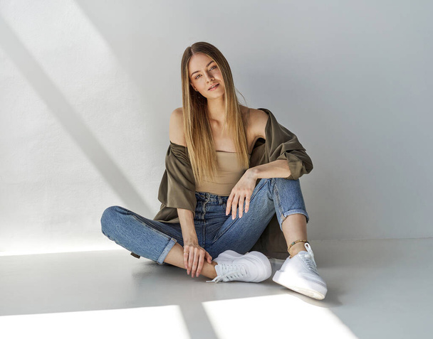 Sexy blonde female model sitting  - Valokuva, kuva