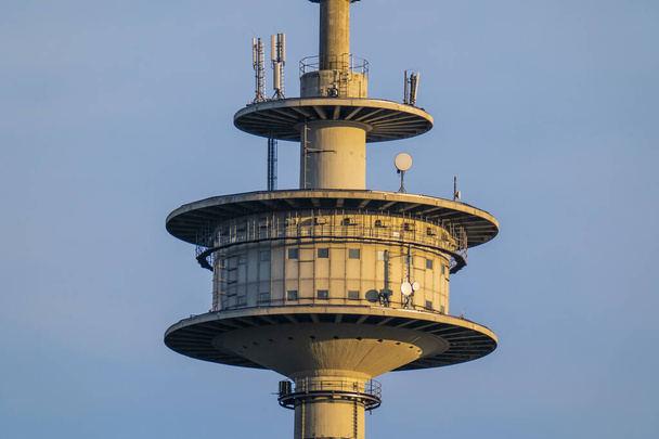 Close-up of the platform of a TV tower in front of a blue sky. High quality photo - Fotoğraf, Görsel