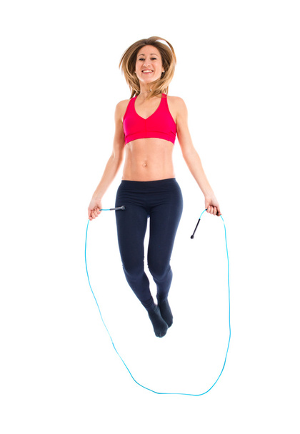 Sport woman jumping rope  - Valokuva, kuva