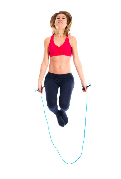 Sport woman jumping rope  - Valokuva, kuva