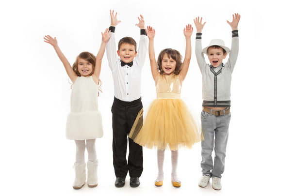 Boldog gyerekek ünnepi ruhát csoportja. - Fotó, kép