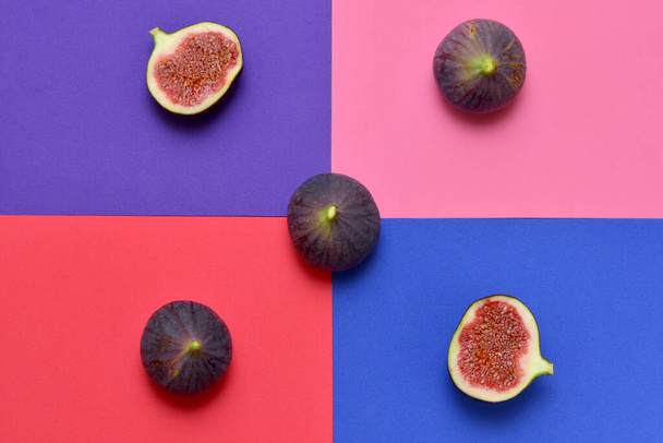 ripe figs on a colorful bright background, aesthetics 90 - Foto, Imagen