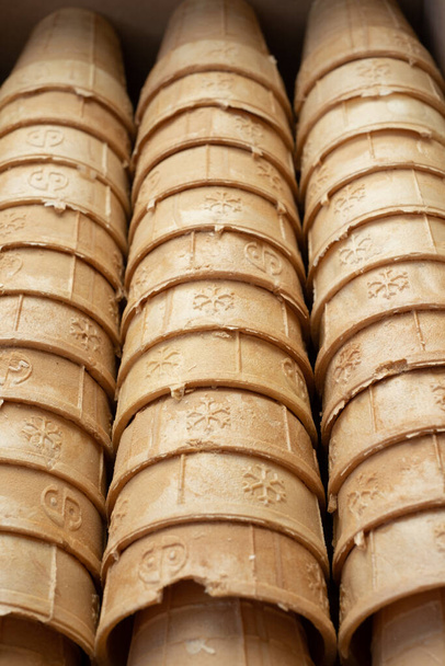 Empty delicious ice-cream waffles cones. Ready to be filled with ice cream. - Photo, Image