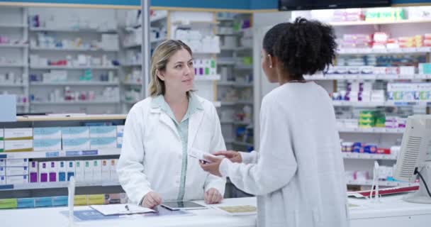 Customer, pharmacist and communication help for medicine, pharmacy healthcare product or insurance pills. Slow motion of black woman, wellness worker employee or retail drugs store with medical trust. - Imágenes, Vídeo