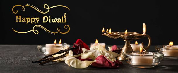 Greeting card for Indian holiday Diwali (Festival of lights) with candles on dark background - Foto, Imagem