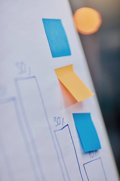 In business, every detail is important. Closeup shot of sticky notes on a chart with data on - Fotoğraf, Görsel