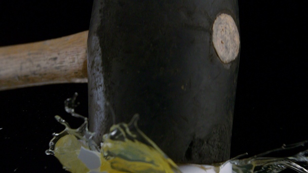 Iron mallet smashes egg - Footage, Video