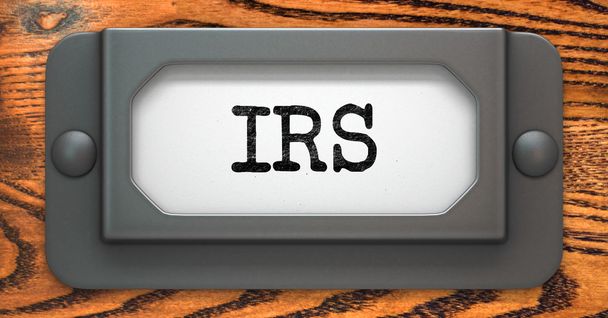 Inscription IRS sur le titulaire de l'étiquette
. - Photo, image
