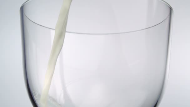 Milk poured in glass - Footage, Video