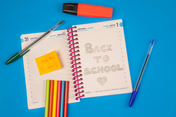 Diary September 1, back to school, goodbye to summer, with a blue background - Foto, immagini