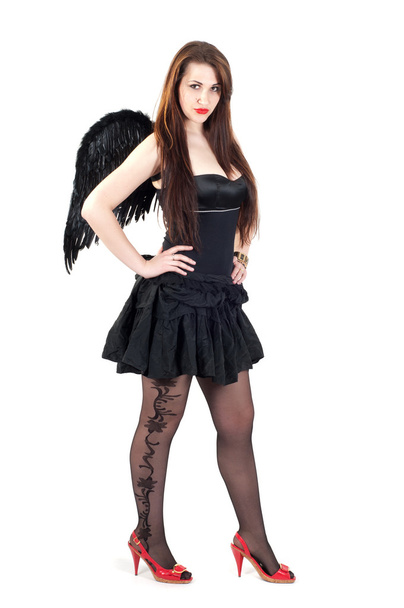 Beautiful brunette woman with black wings - Foto, immagini