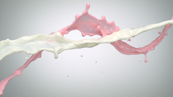 Jahodové mléko stříkající ve vzduchu - Záběry, video
