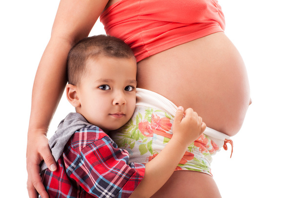Pregnant woman and a little boy - Photo, image