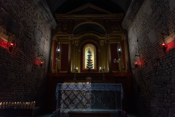 Built in 1400 and rebuilt in 1700. In it there is a faithful reproduction of the Holy House of Loreto as it was before the fire of 1921 and an ancient image of the Madonna. - Photo, image