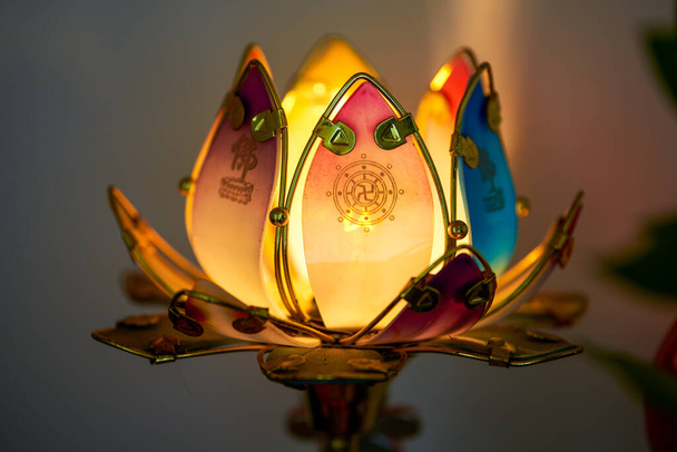 Colorful Buddha lamps used in Buddhist worship, translation: Buddha. - Φωτογραφία, εικόνα