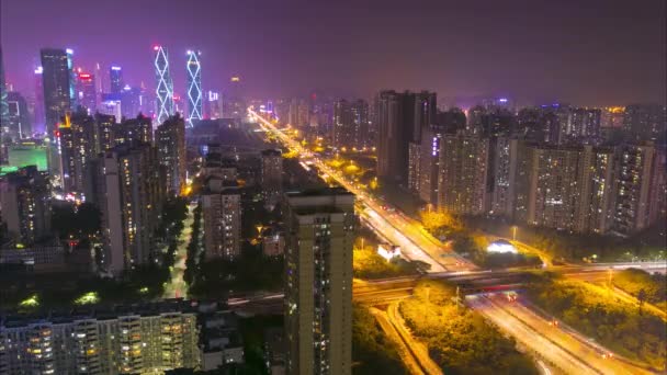 Urban timelapse of China city with traffic of cars and beautiful skyscrapers with business centers. City center in Asia traffic cars on the street - Filmagem, Vídeo