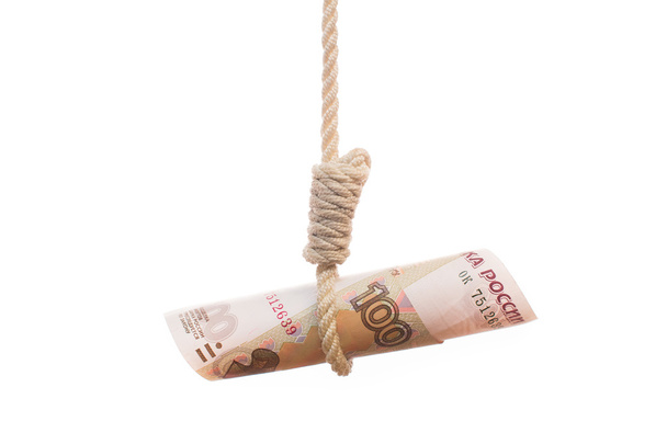 Devaluating money hanging on the rope - Photo, Image