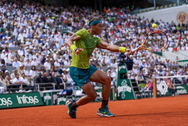 PARIS, FRANCE - JUNE 5, 2022: Grand Slam champion Rafael Nadal of Spain in action during his men's singles final match against Casper Ruud of Norway at 2022 Roland Garros in Paris, France - Foto, Imagen
